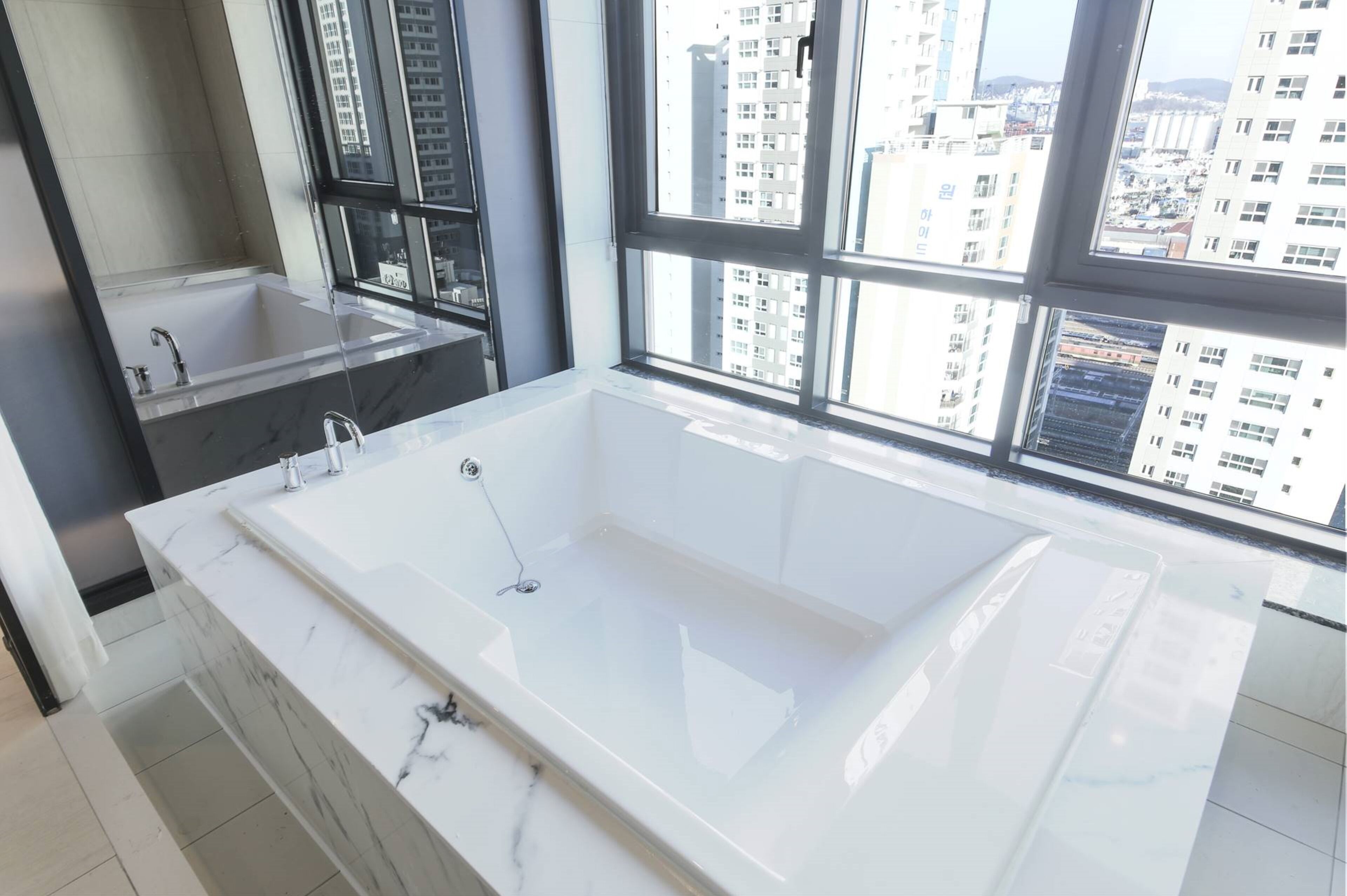 family suite | bathroom | rainfall showerhead, free toiletries, hair dryer, bathrobes