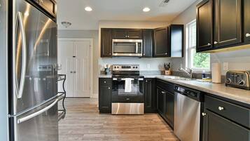 Coffee/tea maker, fridge, microwave, oven