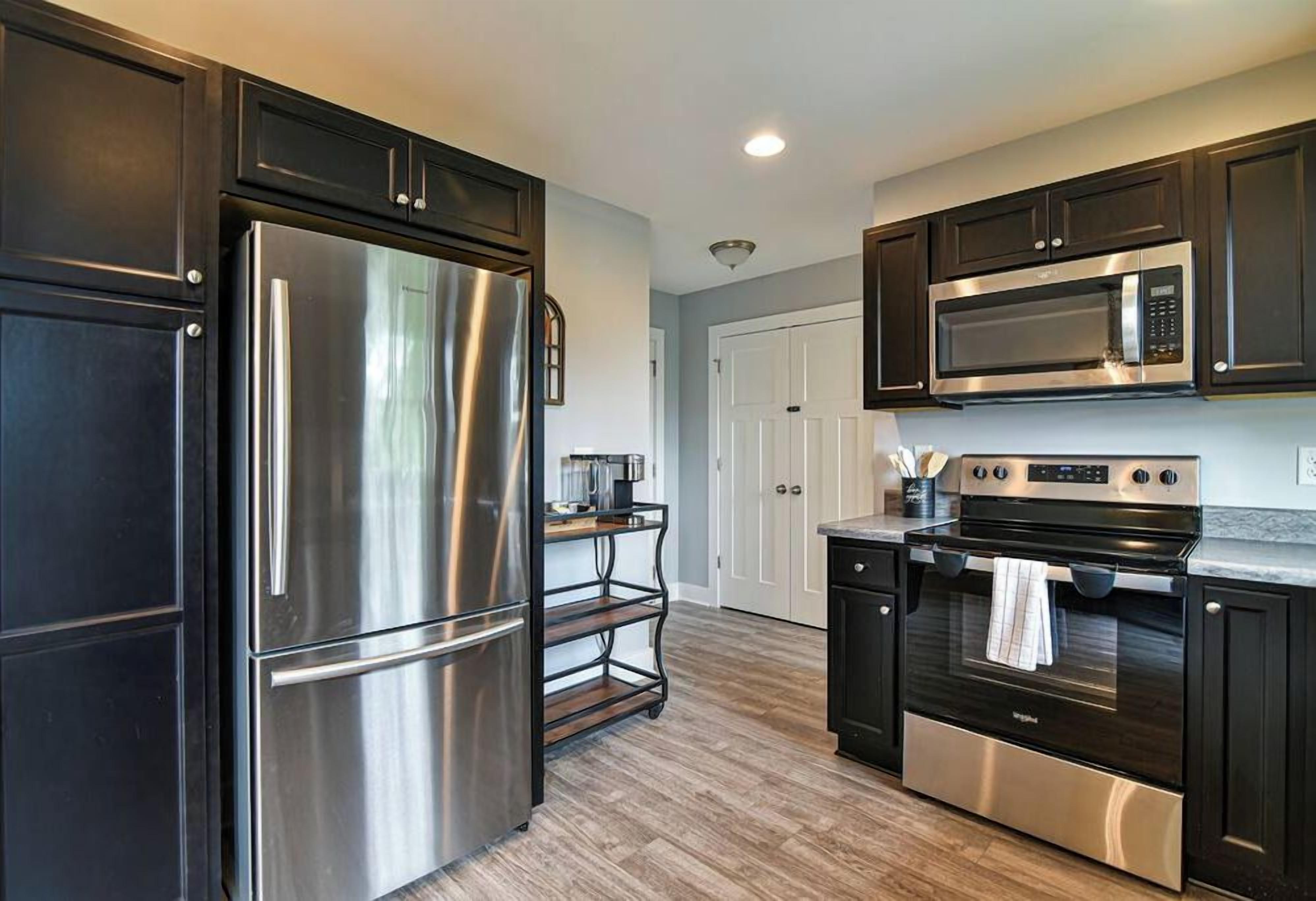 Coffee/tea maker, fridge, microwave, oven