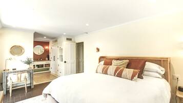 1 bedroom, desk, iron/ironing board, travel crib