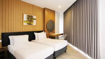 Habitación Deluxe (Grand Deluxe King & Grand Deluxe Twin) | 1 habitación, ropa de cama de alta calidad, minibar y escritorio