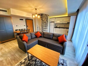 Presidential Apartment | Living area | 120-cm Smart TV with satellite channels, TV