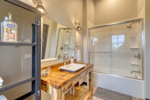 Bathtub, hair dryer, towels