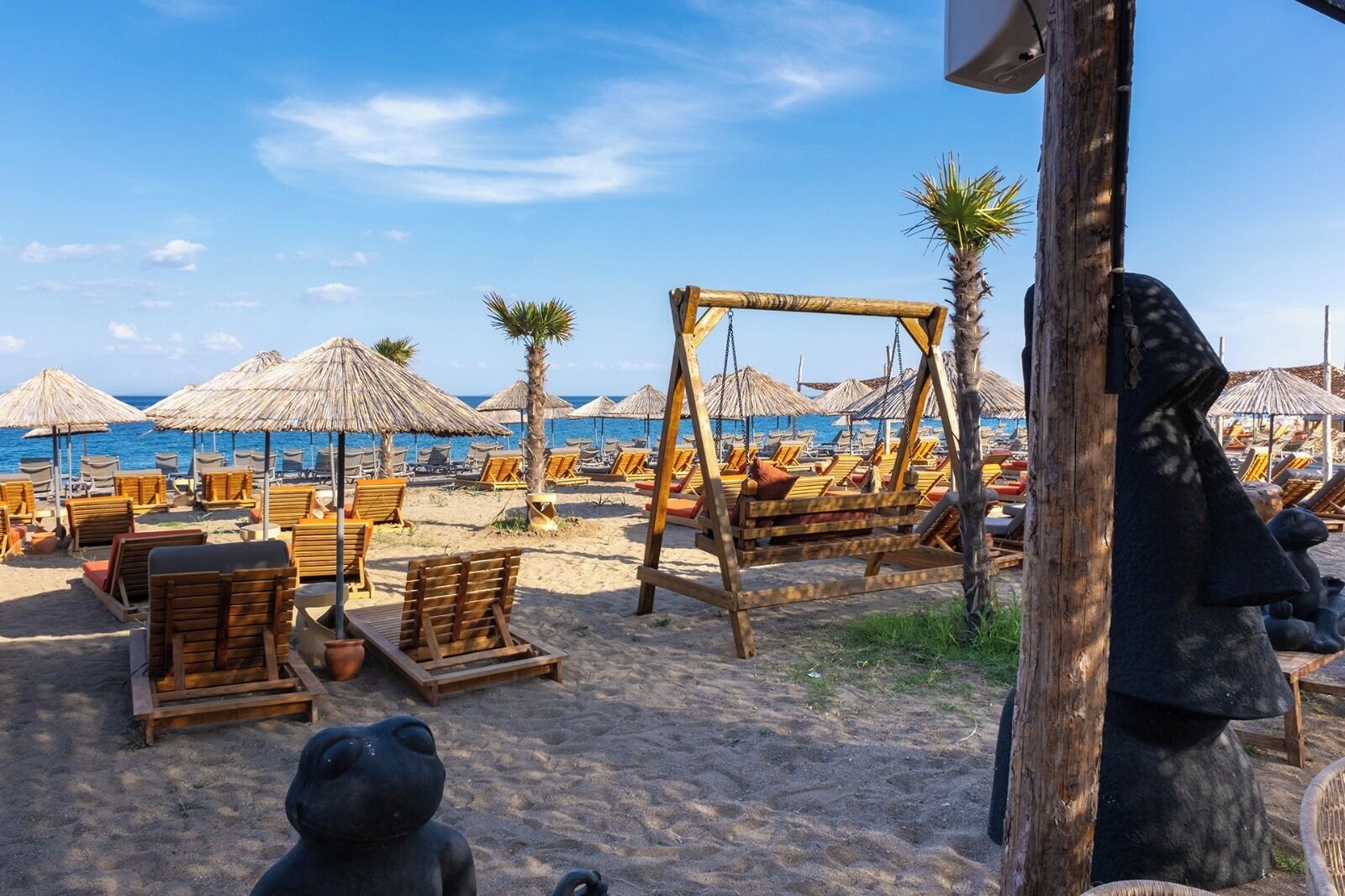 private beach, sun-loungers, beach umbrellas, beach bar