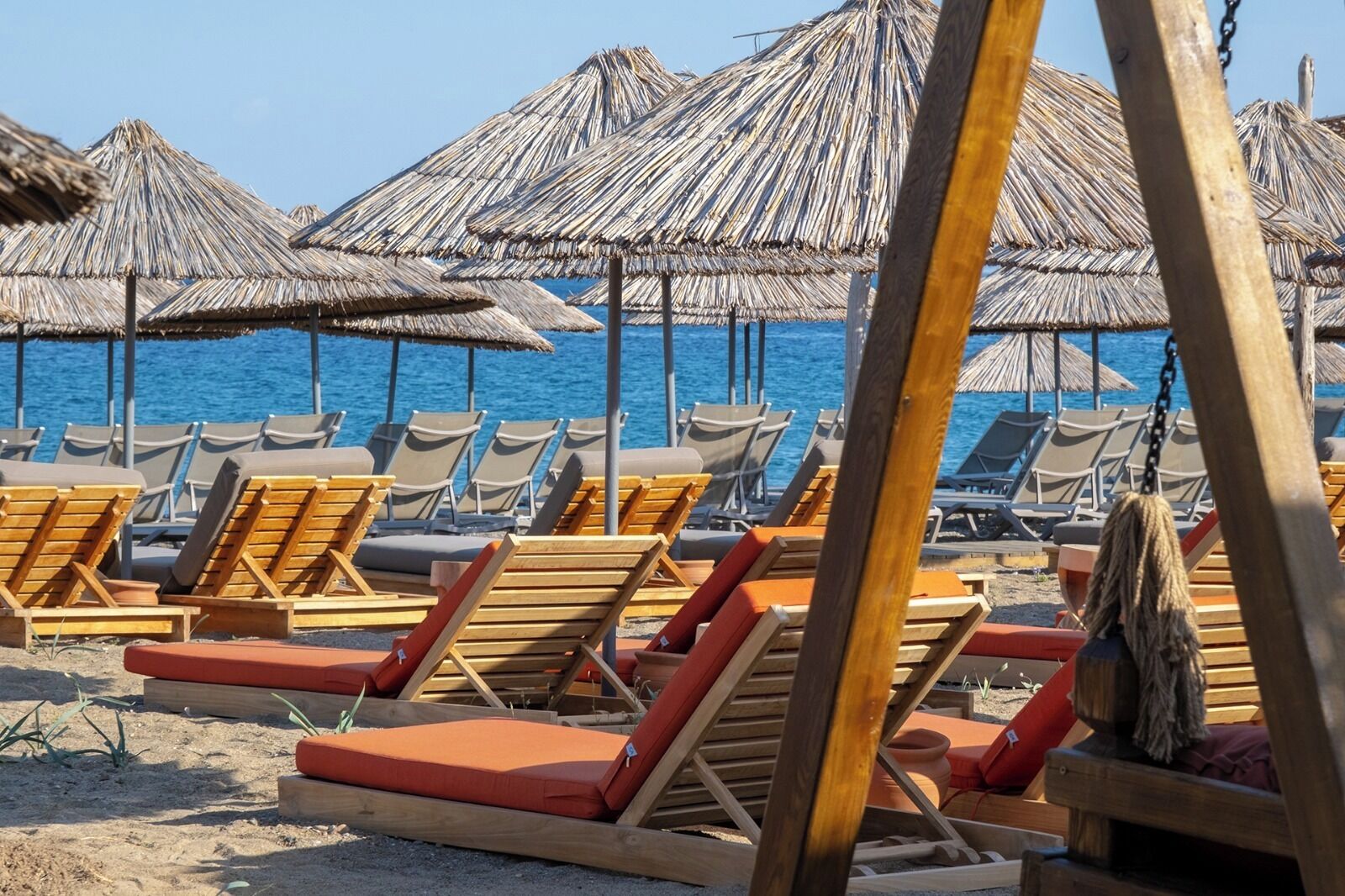 private beach, sun-loungers, beach umbrellas, beach bar