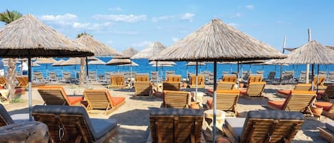 Private beach, sun loungers, beach umbrellas, beach bar