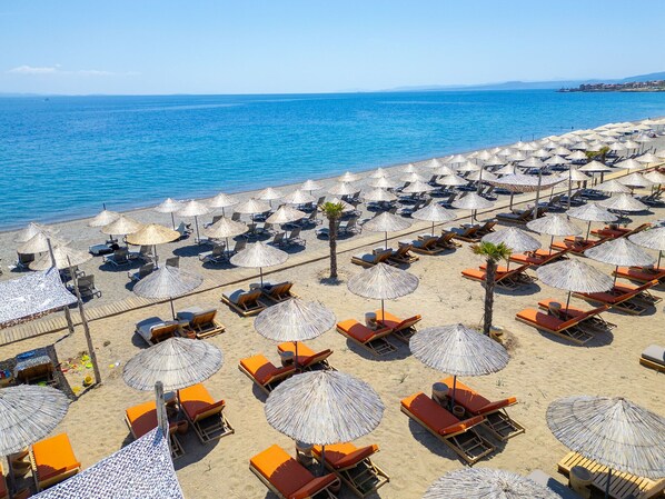 Private beach, sun loungers, beach umbrellas, beach bar