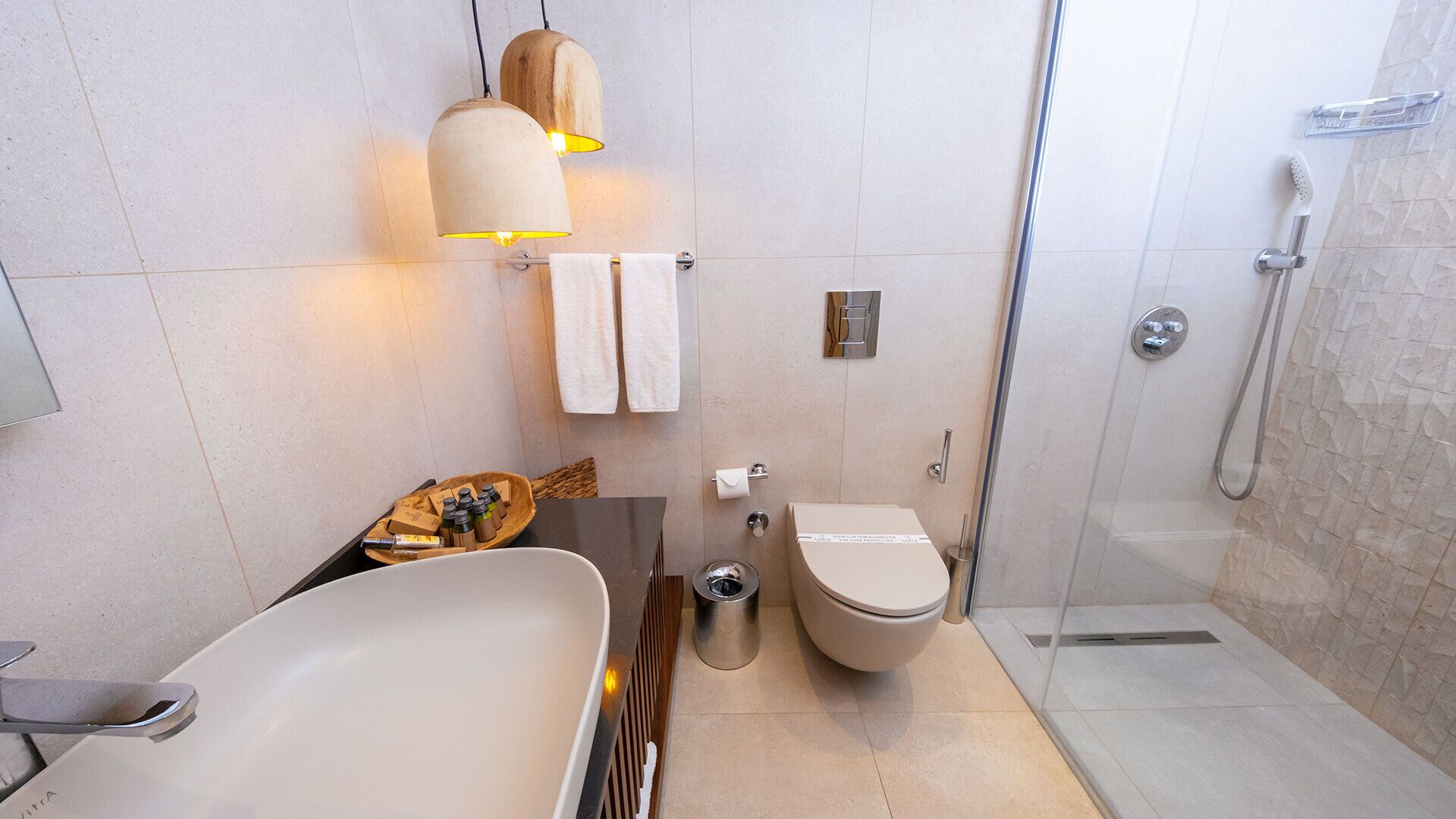 family suite | bathroom | shower, rainfall showerhead, free toiletries, hair dryer