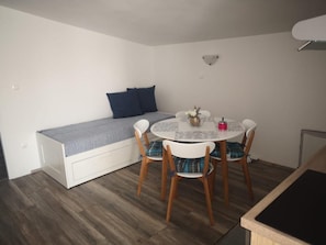 Romantic Apartment, 1 Bedroom, Balcony, Garden View | Living area | 80-cm TV with cable channels - Apartments Tara (Razanac)