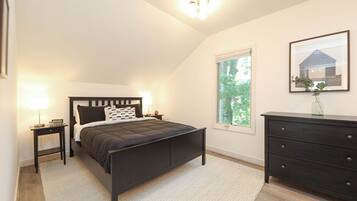 1 bedroom, desk, iron/ironing board, travel crib