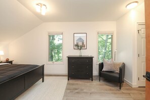 1 bedroom, desk, iron/ironing board, travel crib