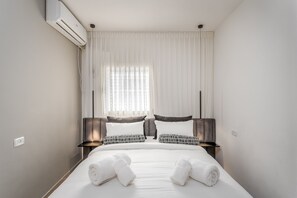 Departamento | 1 habitación, sábanas de algodón egipcio y ropa de cama de alta calidad 