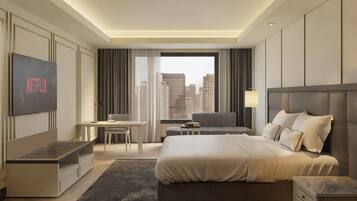 Minibar, desk, laptop workspace, iron/ironing board