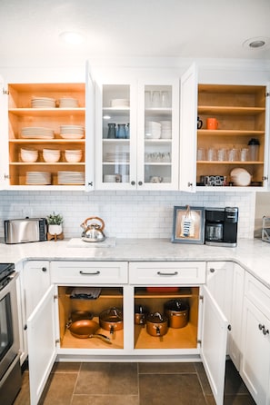 Full kitchen stocked with all the essentials to serve food and drinks. - House on the Golf Course with 6-Seater Golf Cart - 1 mi to Beach/Shopping/Food (Miramar Beach)