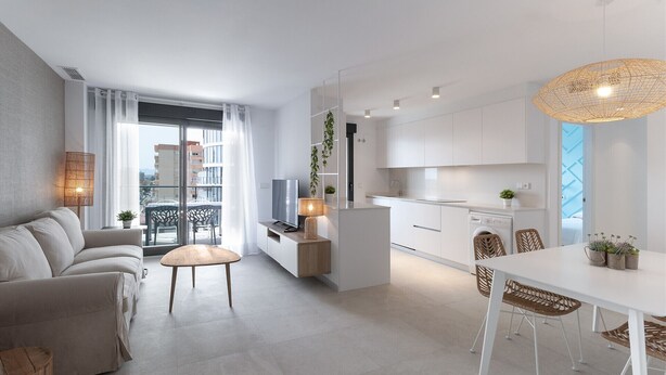 A modern apartment with a living area, kitchen, and dining space. - Amazing holidays in this  New condo mediterranean style. Wifi - only families (Playa de Gandía)