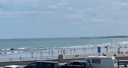 Beach front , across the street form the sand