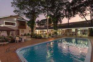 Outdoor pool, free cabanas, pool umbrellas