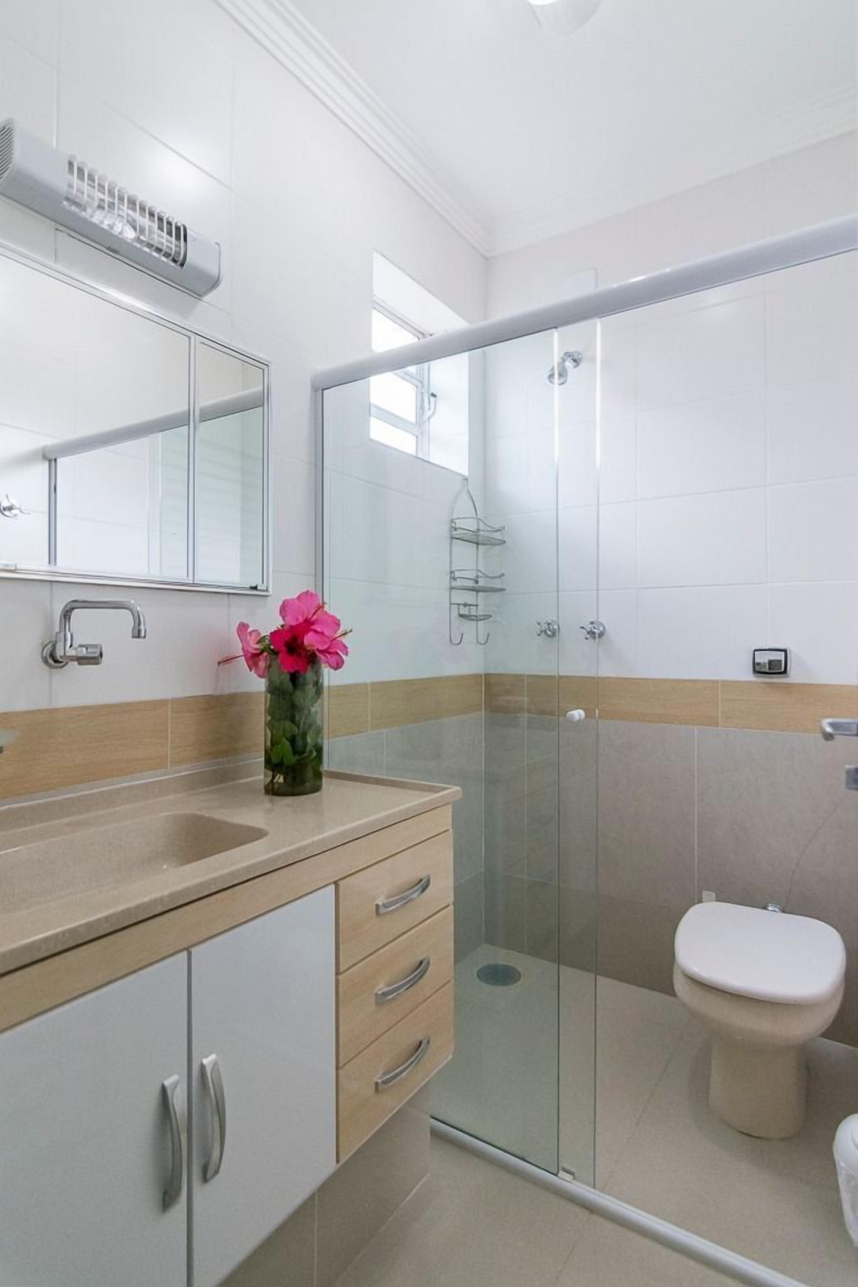 economy studio suite | bathroom | shower, rainfall showerhead, towels