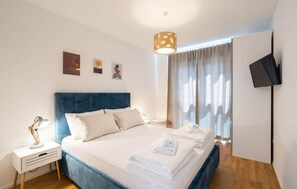 2 quartos, berço de viagem, Wi-Fi de cortesia, roupa de cama