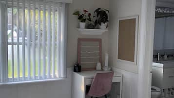 Bathtub, hair dryer, towels, soap