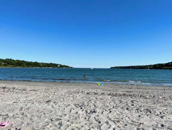 Enjoy a serene beach experience with access to the ocean and lush surroundings.