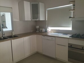 Departamento, 1 habitación, Terraza, vista al jardín | Cocina privada