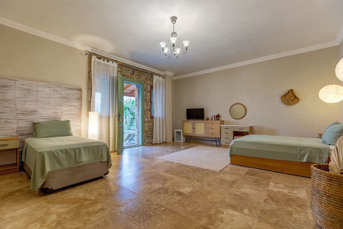 Deluxe Room, Patio, Pool View (1) | 1 bedroom, minibar, in-room safe, individually decorated