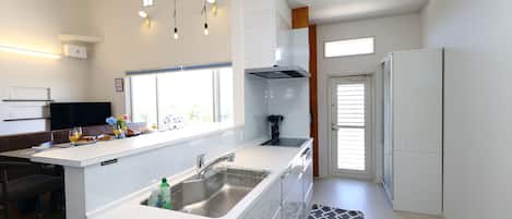 Luxury Villa | Private kitchen | Fridge, microwave, stovetop, toaster