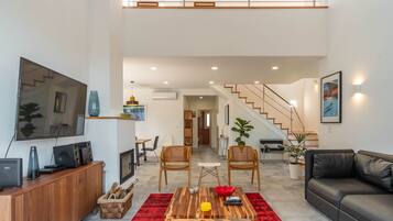 48-inch Smart TV with cable channels, fireplace, DVD player