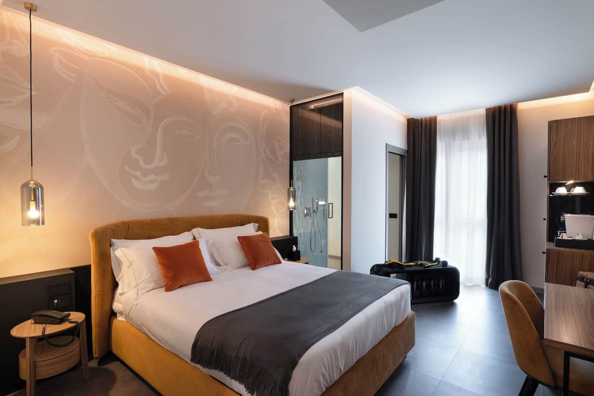 Premium bedding, memory-foam beds, minibar, in-room safe