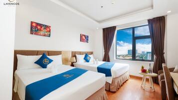 Deluxe Twin Room, City View | Minibar, in-room safe, desk, laptop workspace