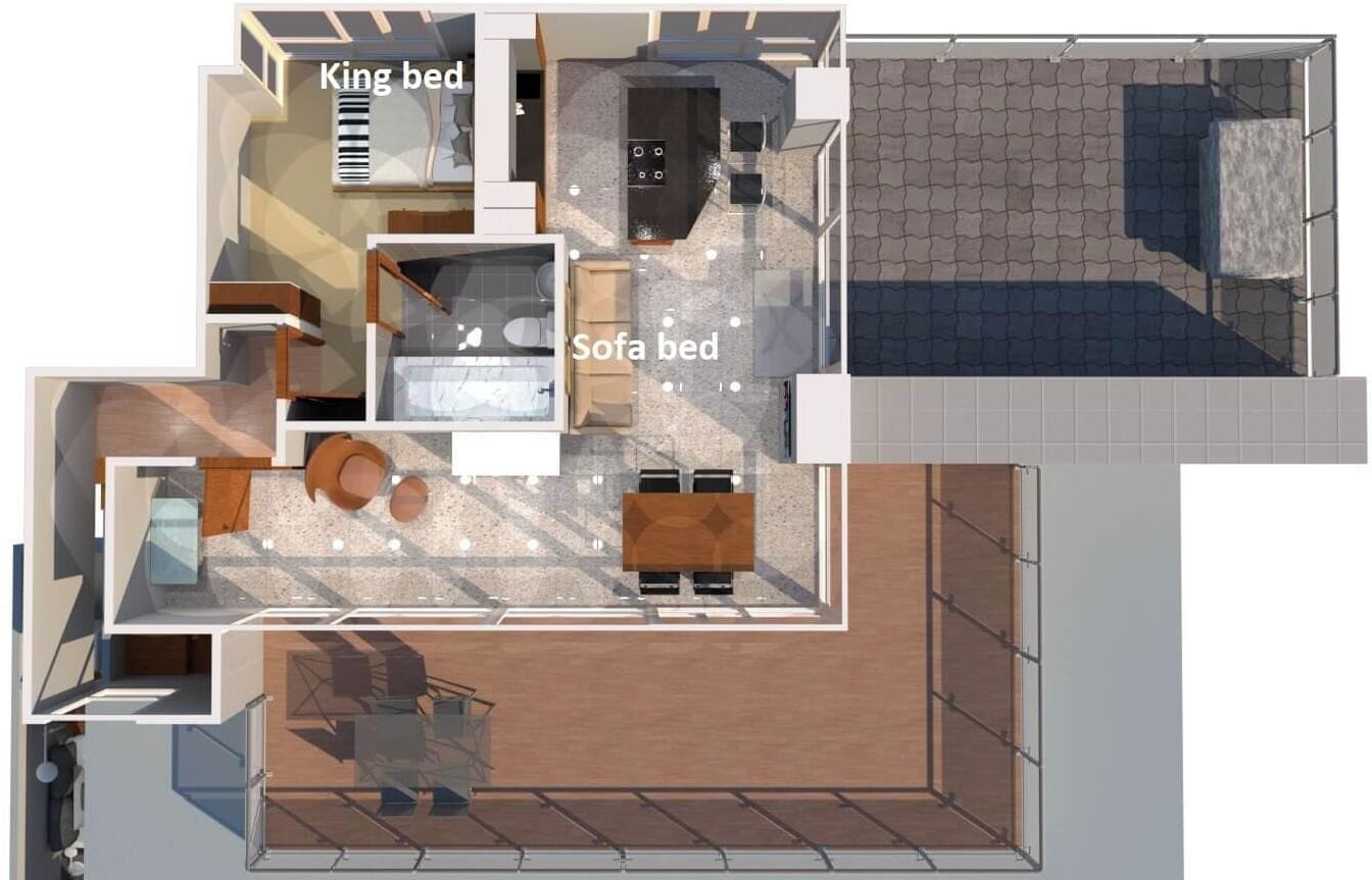 A floor plan of a hotel room with a king bed, a sofa bed, a kitchenette, and a bathroom.