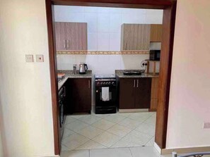 Fridge, microwave, oven, stovetop - 2- Bedroom Gated Community Storey Apartment (Taifa)
