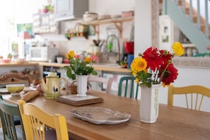 Enjoy a warm and inviting dining experience in this beautifully set table.