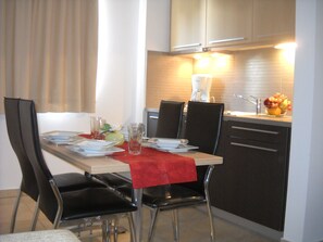 Microwave, stovetop, coffee/tea maker, cookware/dishes/utensils