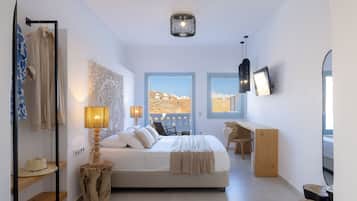 Deluxe kamer | Luxe beddengoed, individueel gedecoreerd, een bureau, een laptopwerkplek