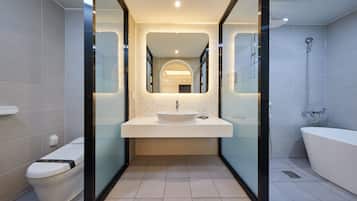 Signature Twin Room | Bathroom | Hair dryer, bathrobes, bidet, towels