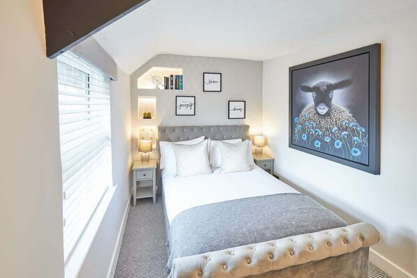 2 bedrooms, premium bedding, iron/ironing board, WiFi