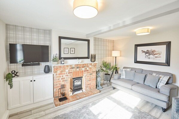 Flat-screen TV, fireplace, offices