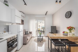 Apartment | Living area | 55-inch Smart TV with cable channels, TV - Designed One bdr with balcony (Jerusalem)