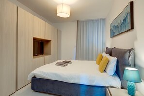 2 slaapkamers, een strijkplank/strijkijzer