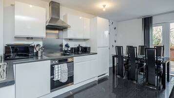 Apartment | Private kitchen | Fridge, microwave, oven, stovetop