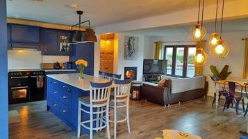 Microwave, dishwasher, high chair, cookware/dishes/utensils