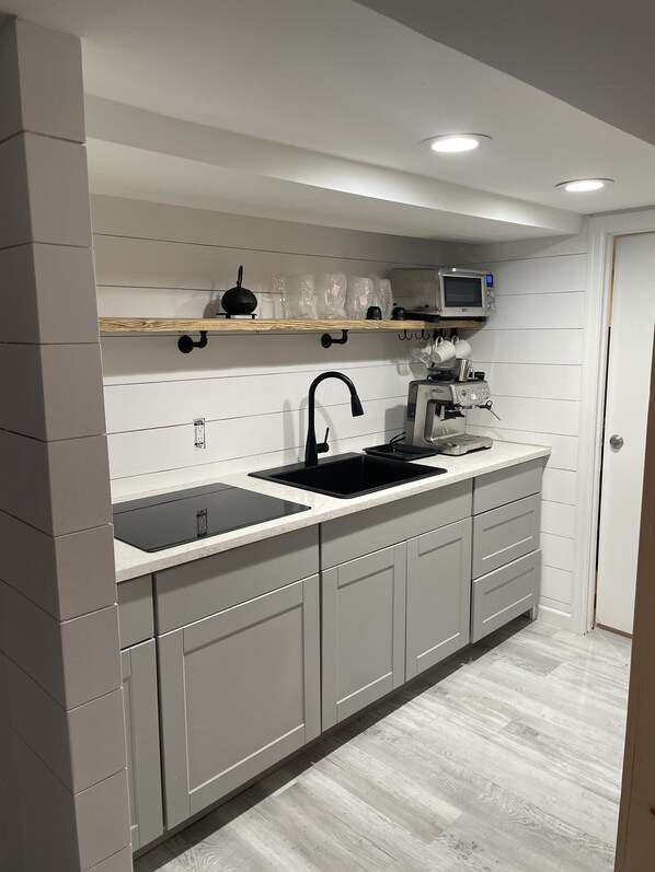 Fridge, coffee/tea maker, toaster, coffee grinder