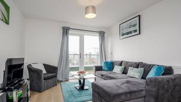 Apartment | Living room | 30-inch TV with digital channels