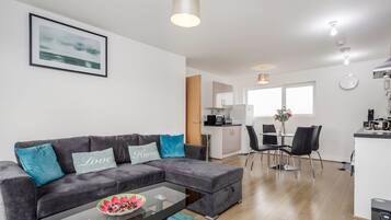 Apartment | Living room | 30-inch TV with digital channels