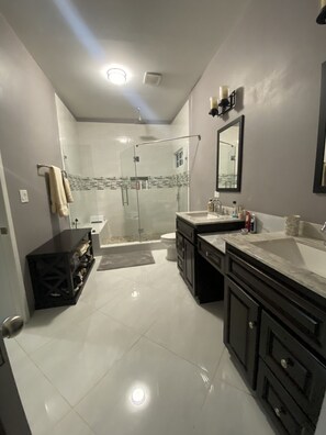 Shower, hair dryer, towels, soap