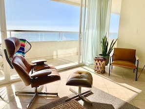 Relax in classically appointed furniture and enjoy ocean views for miles.
