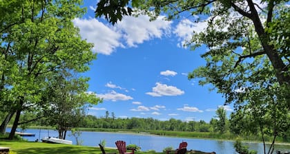 Start each morning on the porch with warm sunshine and beautiful waterfront view