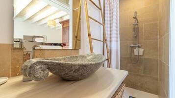 Combined shower/tub, hair dryer, towels, soap